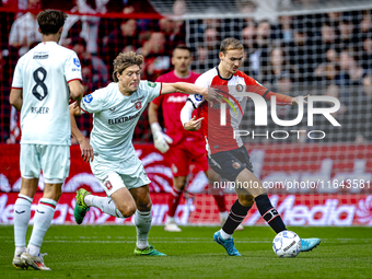 FC Twente forward Sam Lammers and Feyenoord Rotterdam defender Thomas Beelen play during the match between Feyenoord and Twente at the Feyen...