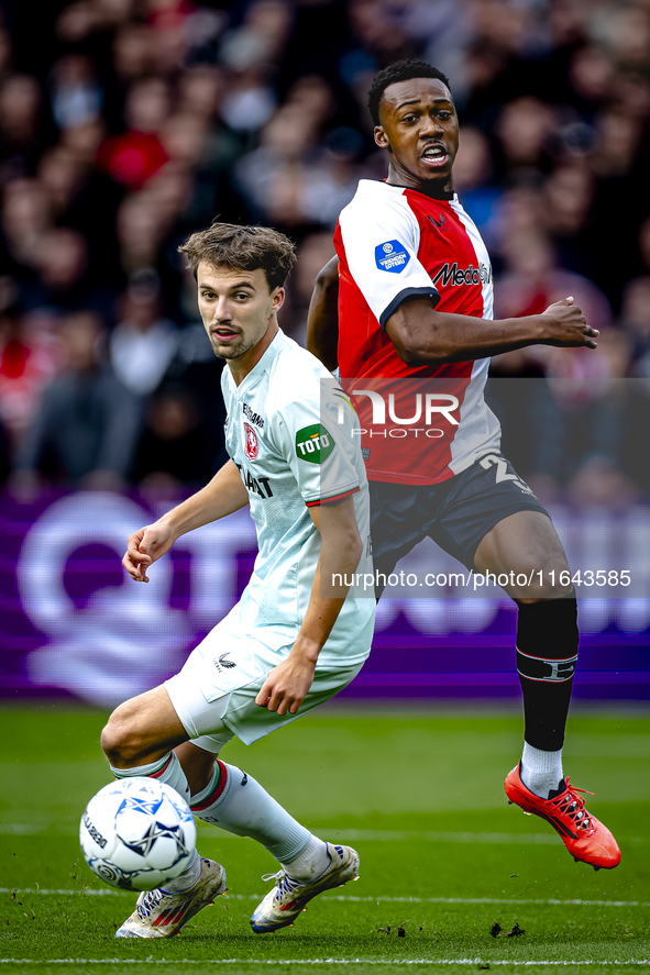 Feyenoord Rotterdam midfielder Antoni Milambo and FC Twente midfielder Youri Regeer play during the match between Feyenoord and Twente at th...