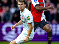 Feyenoord Rotterdam midfielder Antoni Milambo and FC Twente midfielder Youri Regeer play during the match between Feyenoord and Twente at th...