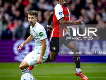 Feyenoord Rotterdam midfielder Antoni Milambo and FC Twente midfielder Youri Regeer play during the match between Feyenoord and Twente at th...