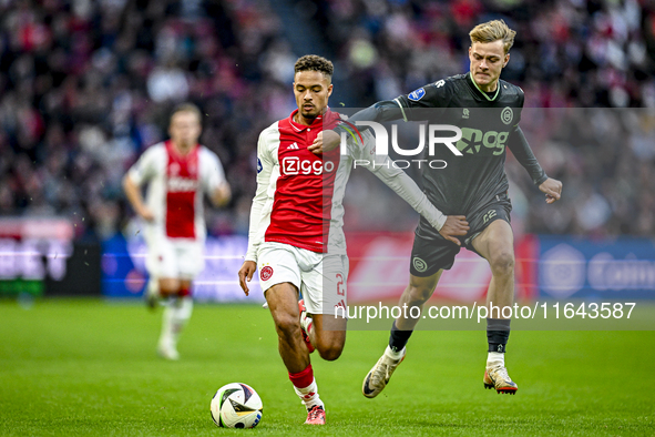 AFC Ajax Amsterdam defender Devyne Rensch and FC Groningen defender Finn Stam play during the match between Ajax and Groningen at the Johan...