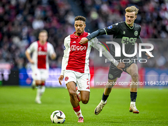 AFC Ajax Amsterdam defender Devyne Rensch and FC Groningen defender Finn Stam play during the match between Ajax and Groningen at the Johan...