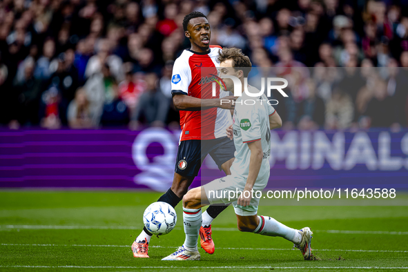 Feyenoord Rotterdam midfielder Antoni Milambo and FC Twente midfielder Youri Regeer play during the match between Feyenoord and Twente at th...