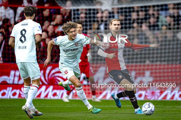 FC Twente forward Sam Lammers and Feyenoord Rotterdam defender Thomas Beelen play during the match between Feyenoord and Twente at the Feyen...