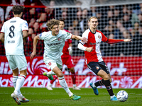 FC Twente forward Sam Lammers and Feyenoord Rotterdam defender Thomas Beelen play during the match between Feyenoord and Twente at the Feyen...