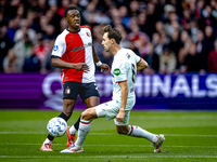 Feyenoord Rotterdam midfielder Antoni Milambo and FC Twente midfielder Youri Regeer play during the match between Feyenoord and Twente at th...