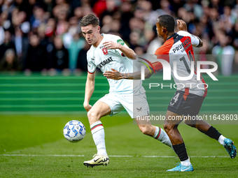 FC Twente forward Daan Rots and Feyenoord Rotterdam forward Igor Paixao play during the match between Feyenoord and Twente at the Feyenoord...