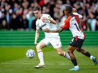 FC Twente forward Daan Rots and Feyenoord Rotterdam forward Igor Paixao play during the match between Feyenoord and Twente at the Feyenoord...