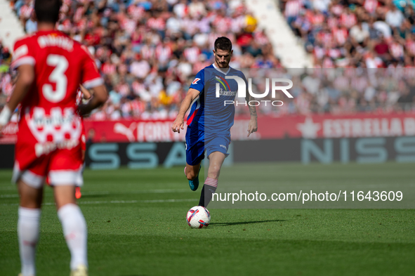 Players are in action during the LaLiga EA Sports match between Girona FC and Athletic Club de Bilbao at Montilivi Stadium in Girona, Spain,...