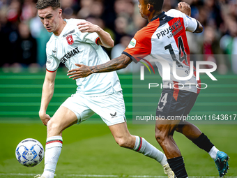 FC Twente forward Daan Rots and Feyenoord Rotterdam forward Igor Paixao play during the match between Feyenoord and Twente at the Feyenoord...