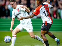 FC Twente forward Daan Rots and Feyenoord Rotterdam forward Igor Paixao play during the match between Feyenoord and Twente at the Feyenoord...