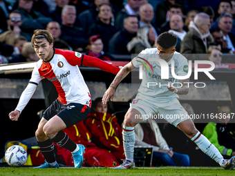 Feyenoord Rotterdam forward Ayase Ueda and FC Twente defender Mees Hilgers play during the match between Feyenoord and Twente at the Feyenoo...