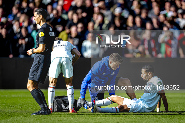 FC Twente defender Anass Salah-Eddine gets injured during the match between Feyenoord and Twente at the Feyenoord stadium De Kuip for the Du...