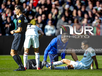 FC Twente defender Anass Salah-Eddine gets injured during the match between Feyenoord and Twente at the Feyenoord stadium De Kuip for the Du...