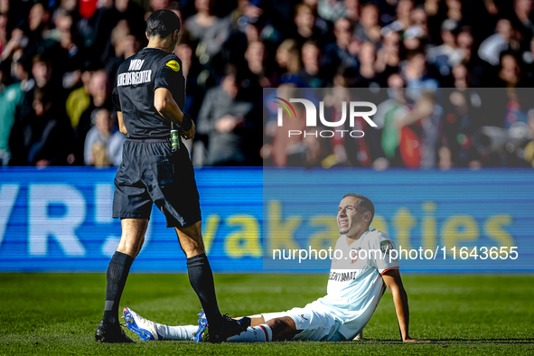 FC Twente defender Anass Salah-Eddine gets injured during the match between Feyenoord and Twente at the Feyenoord stadium De Kuip for the Du...