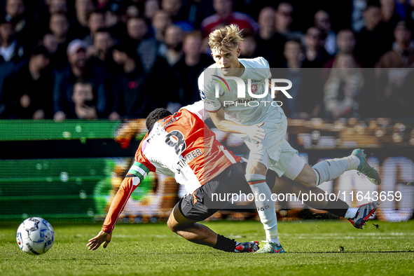 Feyenoord Rotterdam midfielder Quinten Timber and FC Twente defender Max Bruns play during the match between Feyenoord and Twente at the Fey...