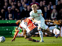 Feyenoord Rotterdam midfielder Quinten Timber and FC Twente defender Max Bruns play during the match between Feyenoord and Twente at the Fey...