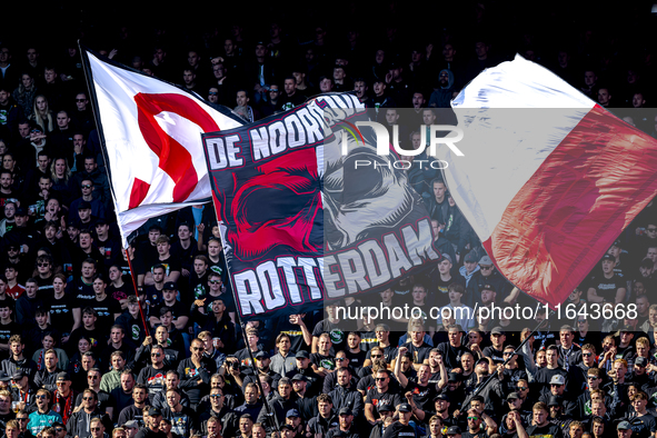 Supporters of Feyenoord Rotterdam attend the match between Feyenoord and Twente at the Feyenoord stadium De Kuip for the Dutch Eredivisie se...