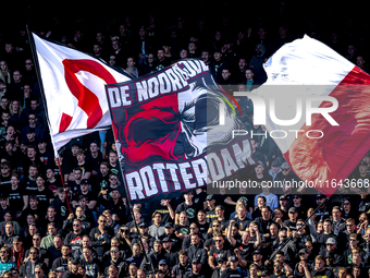 Supporters of Feyenoord Rotterdam attend the match between Feyenoord and Twente at the Feyenoord stadium De Kuip for the Dutch Eredivisie se...