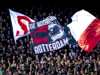 Supporters of Feyenoord Rotterdam attend the match between Feyenoord and Twente at the Feyenoord stadium De Kuip for the Dutch Eredivisie se...