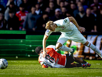 Feyenoord Rotterdam midfielder Quinten Timber and FC Twente defender Max Bruns play during the match between Feyenoord and Twente at the Fey...