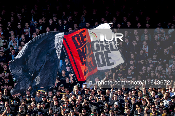 Supporters of Feyenoord Rotterdam attend the match between Feyenoord and Twente at the Feyenoord stadium De Kuip for the Dutch Eredivisie se...