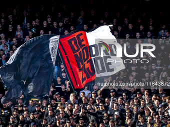 Supporters of Feyenoord Rotterdam attend the match between Feyenoord and Twente at the Feyenoord stadium De Kuip for the Dutch Eredivisie se...