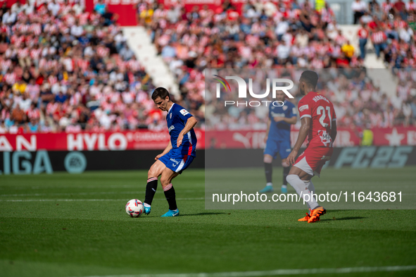 Players are in action during the LaLiga EA Sports match between Girona FC and Athletic Club de Bilbao at Montilivi Stadium in Girona, Spain,...