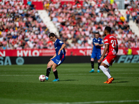 Players are in action during the LaLiga EA Sports match between Girona FC and Athletic Club de Bilbao at Montilivi Stadium in Girona, Spain,...