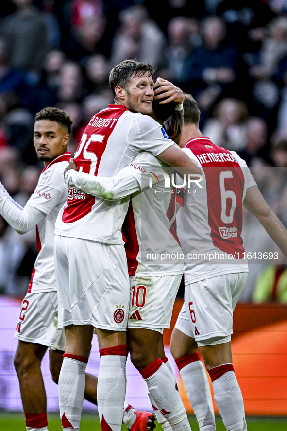 AFC Ajax Amsterdam forwards Wout Weghorst and Chuba Akpom celebrate the 3-1 goal during the match between Ajax and Groningen at the Johan Cr...