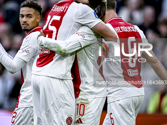 AFC Ajax Amsterdam forwards Wout Weghorst and Chuba Akpom celebrate the 3-1 goal during the match between Ajax and Groningen at the Johan Cr...