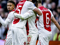 AFC Ajax Amsterdam forwards Wout Weghorst and Chuba Akpom celebrate the 3-1 goal during the match between Ajax and Groningen at the Johan Cr...