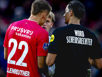 Referee Serdar Gozubuyuk and Feyenoord Rotterdam goalkeeper Timon Wellenreuther are present during the match between Feyenoord and Twente at...