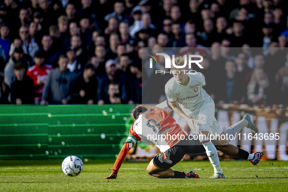 Feyenoord Rotterdam midfielder Quinten Timber and FC Twente defender Max Bruns play during the match between Feyenoord and Twente at the Fey...