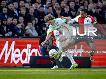 FC Twente forward Sam Lammers and Feyenoord Rotterdam midfielder Quinten Timber play during the match between Feyenoord and Twente at the Fe...