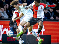 FC Twente forward Sam Lammers and Feyenoord Rotterdam midfielder Quinten Timber play during the match between Feyenoord and Twente at the Fe...