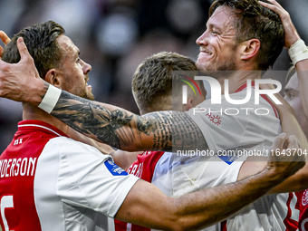 AFC Ajax Amsterdam midfielder Jordan Henderson and forward Wout Weghorst celebrate the 2-1 goal during the match between Ajax and Groningen...