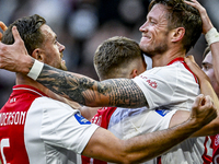 AFC Ajax Amsterdam midfielder Jordan Henderson and forward Wout Weghorst celebrate the 2-1 goal during the match between Ajax and Groningen...