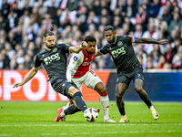 FC Groningen defender Marco Rente, AFC Ajax Amsterdam forward Chuba Akpom, and FC Groningen defender Leandro Bacuna participate during the m...