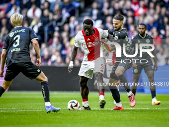 AFC Ajax Amsterdam forward Brian Brobbey and FC Groningen defender Marco Rente play during the match between Ajax and Groningen at the Johan...