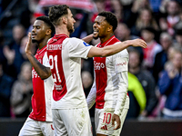 AFC Ajax Amsterdam midfielder Branco van den Boomen and AFC Ajax Amsterdam forward Chuba Akpom celebrate the 3-1 goal during the match betwe...