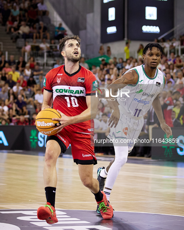 Sergi Garcia of Coviran Granada drives to the basket during the Liga Endesa ACB league basketball match between Coviran Granada and Unicaja...