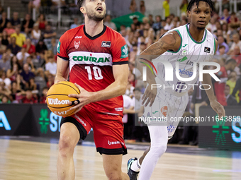 Sergi Garcia of Coviran Granada drives to the basket during the Liga Endesa ACB league basketball match between Coviran Granada and Unicaja...