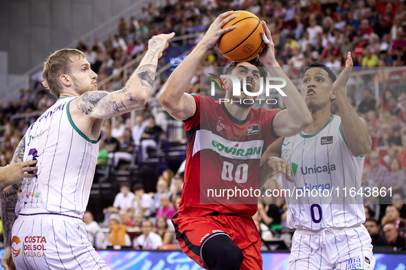 Edgar Vicedo of Coviran Granada and Tyson Perez of Unicaja Malaga battle for the ball during the Liga Endesa ACB league basketball match bet...