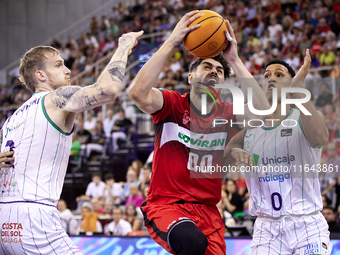 Edgar Vicedo of Coviran Granada and Tyson Perez of Unicaja Malaga battle for the ball during the Liga Endesa ACB league basketball match bet...