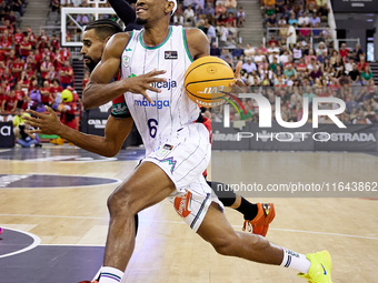 Kameron Taylor of Unicaja Malaga drives to the basket during the Liga Endesa ACB league basketball match between Coviran Granada and Unicaja...