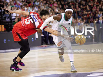 Kendrick Perry of Unicaja Malaga competes for the ball with Ivan Aurrecoechea of Coviran Granada during the Liga Endesa ACB league basketbal...