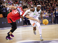 Kendrick Perry of Unicaja Malaga competes for the ball with Ivan Aurrecoechea of Coviran Granada during the Liga Endesa ACB league basketbal...