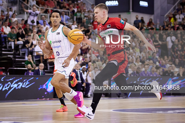 Elias Valtonen of Coviran Granada drives to the basket during the Liga Endesa ACB league basketball match between Coviran Granada and Unicaj...