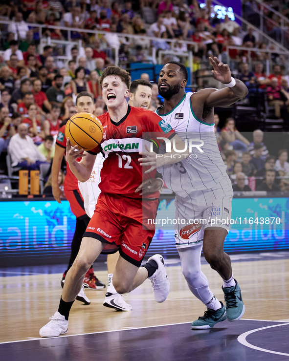 Agustin Ubal of Coviran Granada competes for the ball with Melvin Ejim of Unicaja Malaga during the Liga Endesa ACB league basketball match...